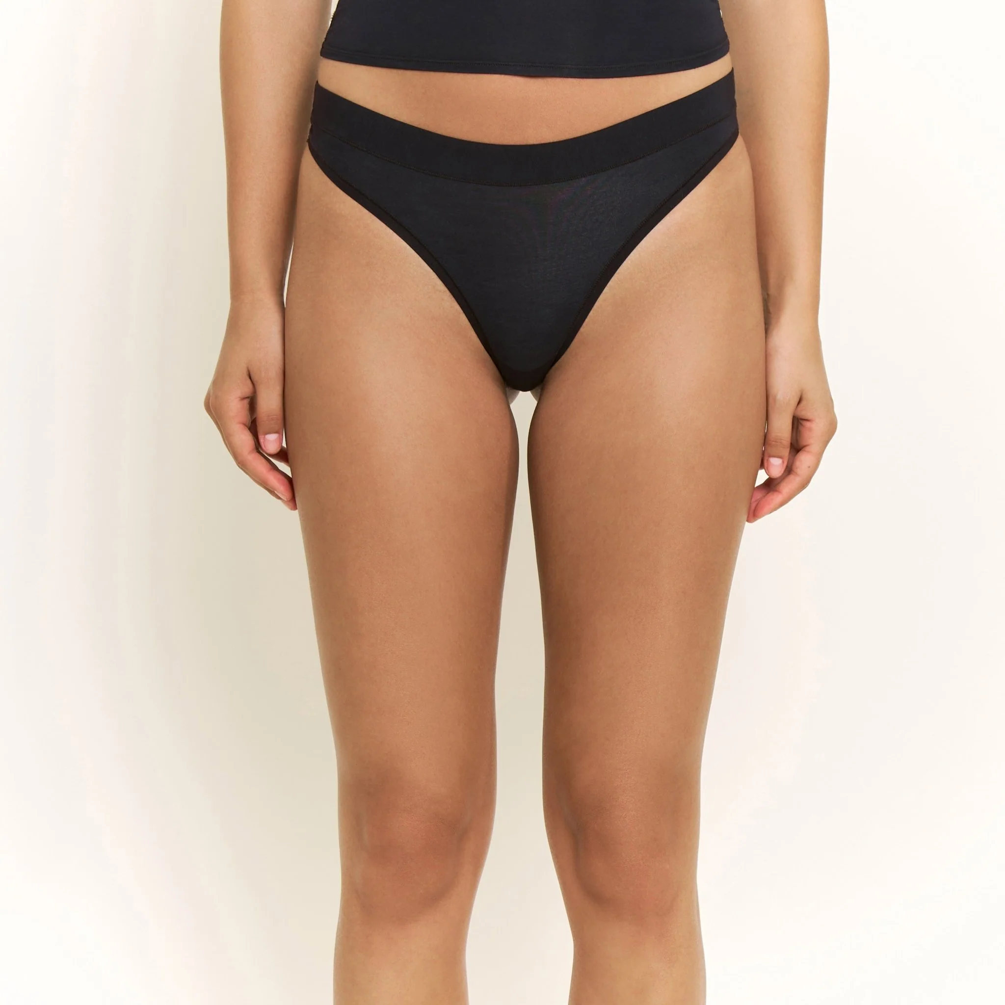 Emery Thong in Black